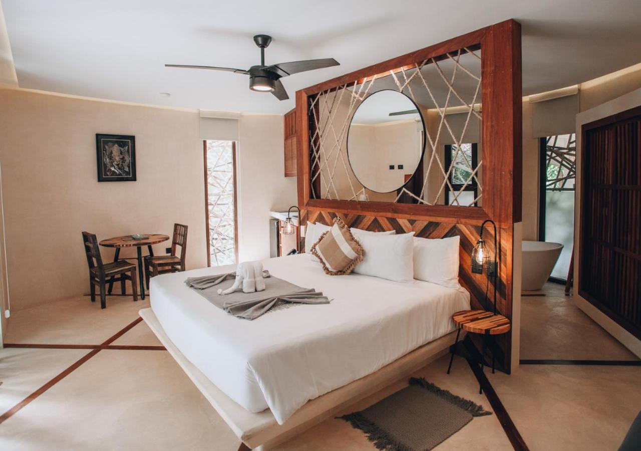 KAN TULUM