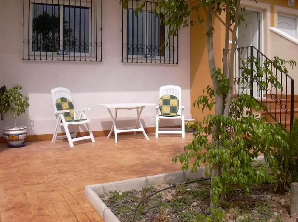 HOUSE WITH 4 BEDROOMS IN ORIHUELA; WITH POOL ACCESS AND ENCLOSED GARDEN - 900 M FROM THE BEACH