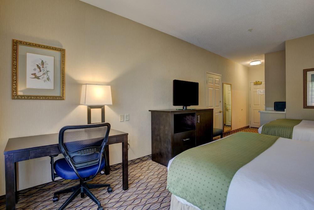HOLIDAY INN HOTEL AND SUITES MIL